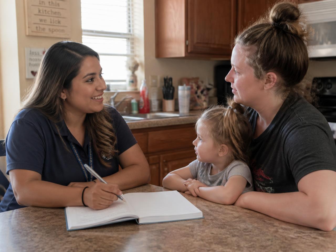 A case manager supporting a family during an in-home visit